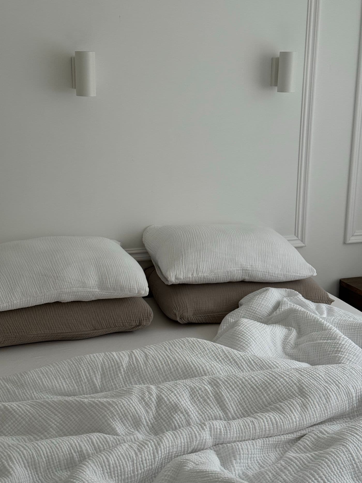Minimalist bedroom with plush pillows